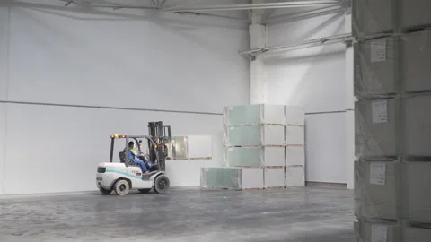 Warehouse or stock of plasterboard sheets or gypsum board at the factory Stock-Footage 142293523