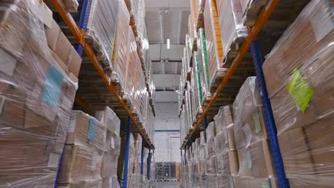 Warehouse with packed goods on racks. The global economy and its logistics. Stock Footage 147119272