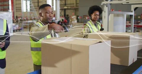 Warehouse packer packing box for orders as belt moving peer scanning waveform Stock Photos