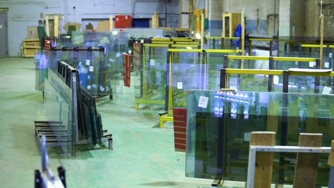 Warehouse at the plant for the production and processing of flat glass. Packs of Stock Footage 94818432