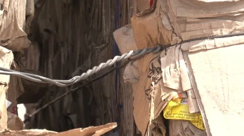 Warehouse for processing waste. Waste paper packed into briquettes. Garbage Video stock 55812672