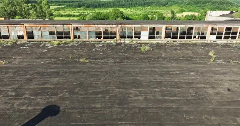 Warehouse Secure Area Next To Small Rural Road Eastern Europe Aerial Zoom Out Stock Footage 300485298