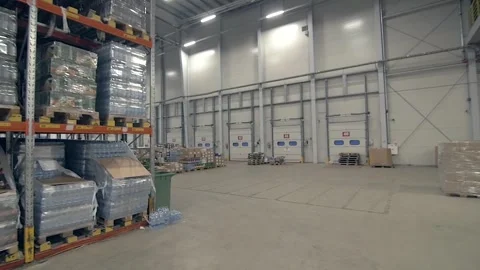 Warehouse with shelves full of various packages and goods Stock Footage 245099890