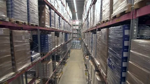 Warehouse with shelves full of various packages and goods Stock Footage 245100152