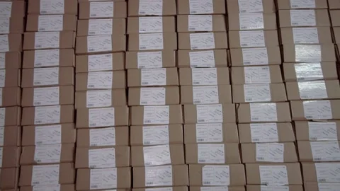 Warehouse with small cardboard boxes. Stock Footage 190982486