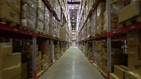 Warehouse, storage at the enterprise. Large racks Stock Footage 112126924
