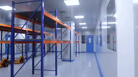 Warehouse store room, cleanroom with colored racks for storage. store. Stock-Footage 297616517