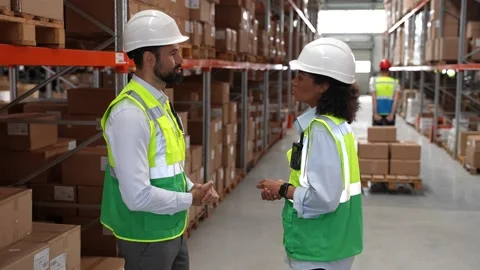 Warehouse supervisors shaking hands during meeting Stock Footage 161951281