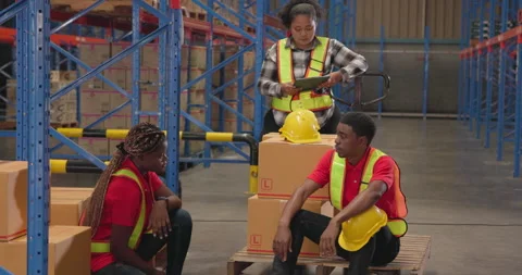 Warehouse team loading delivery boxes - ... | Stock Video | Pond5