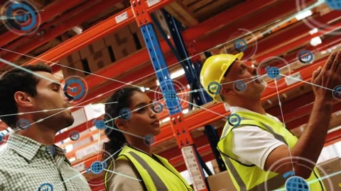 Warehouse team noting blue circle growing into node web over workers lead Stock Footage 329786129