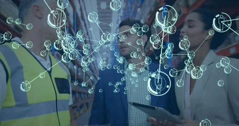 Warehouse tech scanning barcode showing data nodes while manager and rep on Stock Footage 330444018