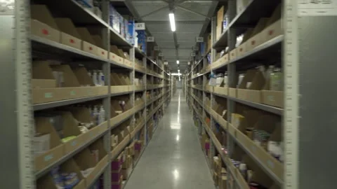 Warehouse, video shooting from hands Vídeos de archivo 327571546