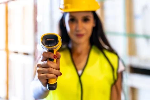 Warehouse worker hold inventory scanner. Stock Photos