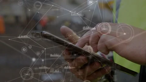 Warehouse worker holding tablet and tapping, initiating node overlay and Stock Footage 333999153