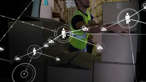 Warehouse worker lifting box and activating node icon expanding network as Stock Footage 320287079