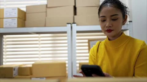 Warehouse worker marking checklist during inventory audit Stock Footage 326277876