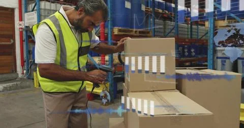 Warehouse worker picking scanner scanning labels activating AR data adjusting Stock Photos