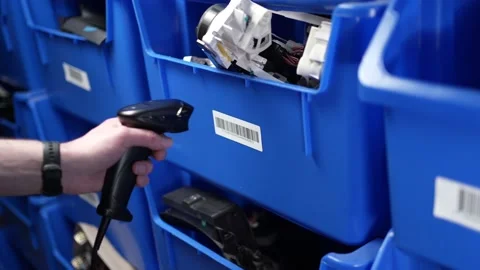 Warehouse Worker Scanning Bar Code Labels To Check Inventory Stock Footage 185125224