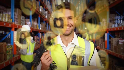 Warehouse worker scanning barcode in aisle updating inventory while data icons Stock Footage 332280703