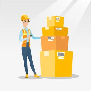 Warehouse worker scanning barcode on box 库存插图