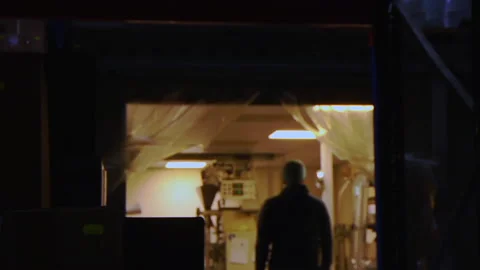 Warehouse Worker In Silohette Stock Footage 136395216