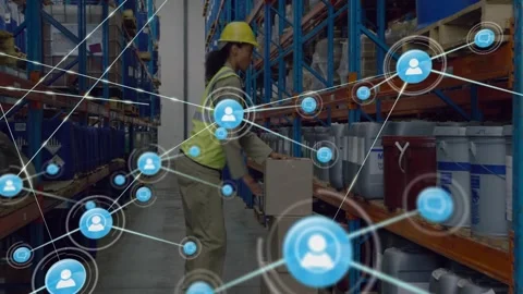 Warehouse worker stacking boxes, blue node appearing and network overlay linking Video stock 330143163