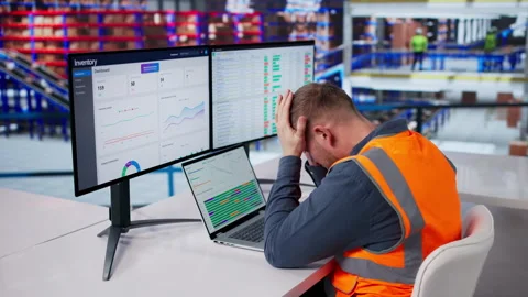 Warehouse Worker Struggles With Computer System, Feeling Confused Stock Footage 331152211
