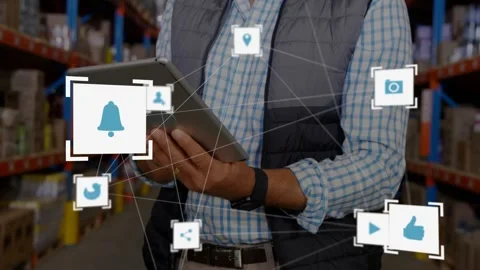 Warehouse worker tapping tablet screen and showing UI icons while scanning racks Stock Footage 328360850