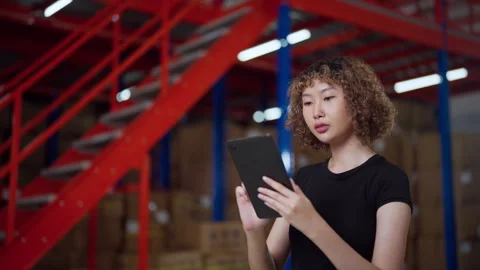 Warehouse Worker Using Tablet Device. Stock Footage 277941454