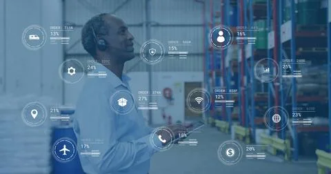 Warehouse worker using tablet, logistics data processing image over warehouse 写真素材