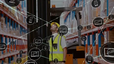 Warehouse worker walking by forklift using radio and scanning racks as IoT icons Stock Footage 330893590