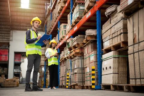 Warehouse worker working together in warehouse Foto stock