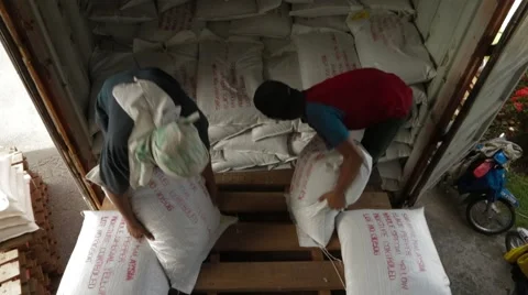 Warehouse Workers Carrying Sacks Stock Footage 61491579