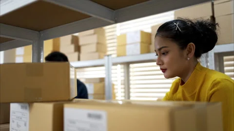 Warehouse workers checking inventory on shelves using tablet Stock Footage 326278068