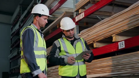 Warehouse Workers Checking Material Inventory With Tablet. Stock Footage 345012811