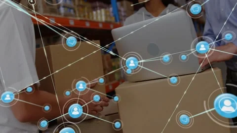 Warehouse workers lifting boxes and typing on laptop, displaying floating 스톡 동영상 328007328
