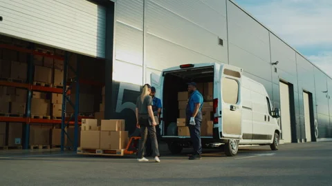 Warehouse Workers loading Van Vehicle Stock Footage 157116285
