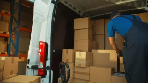 Warehouse Workers loading Van Vehicle Stock Footage 157116513