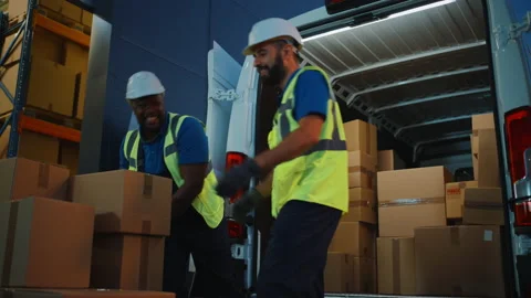 Warehouse Workers loading Van Vehicle Stock Footage 157117131
