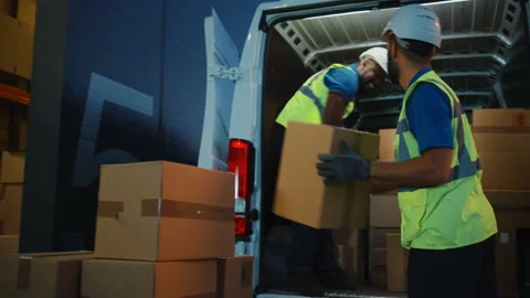 Warehouse Workers loading Van Vehicle Stock Footage 157117218