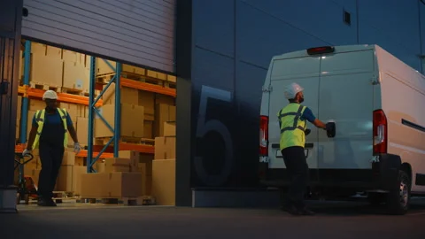 Warehouse Workers loading Van Vehicle Stock Footage 157117380