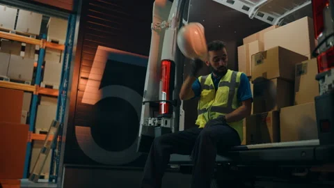 Warehouse Workers loading Van Vehicle Stock Footage 157120781