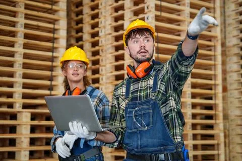 Warehouse Workers Managing Lumber Inventory and Logistics Stock Photos