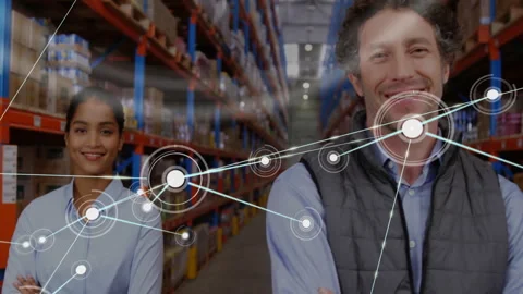 Warehouse workers standing with arms crossed activating digital node network Video stock 309808598