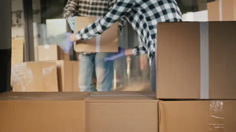 Warehouse workers unload boxes of medicines Stock Footage 139712949
