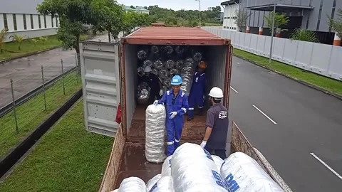 Warehouse Workers Unload Imported Goods From Containers To Trucks Outdoors Stock Footage 304963504