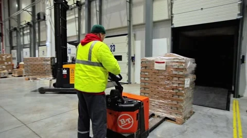 Warehouse Workers Working Preparing orders for Loading Deposit Interior Stock Footage 139333671