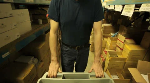 Warehouseman moving stock Stock Footage 22918117