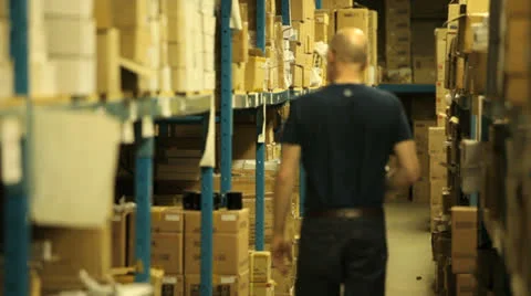 Warehouseman taking stock Stock Footage 22917731