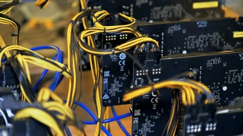 Wares and cables in bitcoin mining farm. Fans on video cards close-up  스톡 동영상 122009647